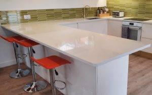 modern kitchen with white worktops